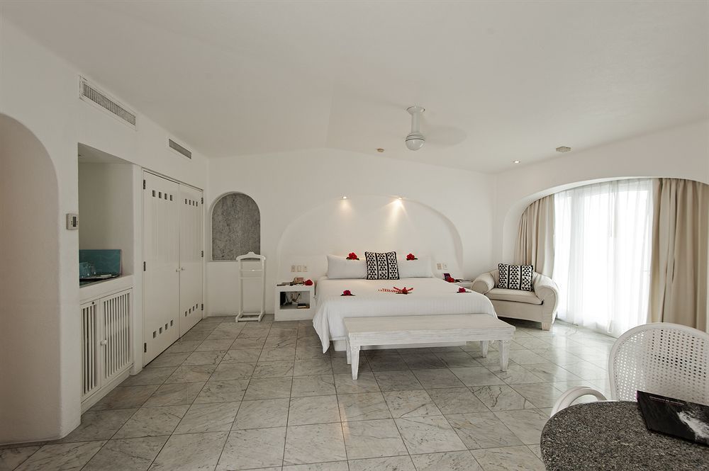 Las Hadas By Brisas Manzanillo Exteriör bild A suite at the resort