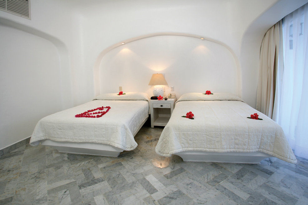 Las Hadas By Brisas Manzanillo Exteriör bild A room at the hotel