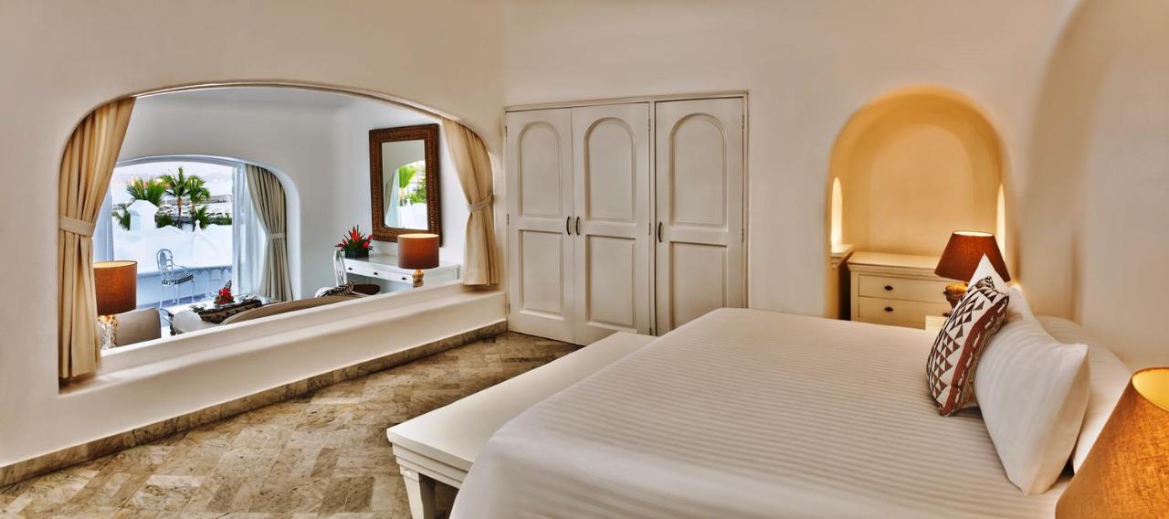 Las Hadas By Brisas Manzanillo Exteriör bild A bedroom at the resort