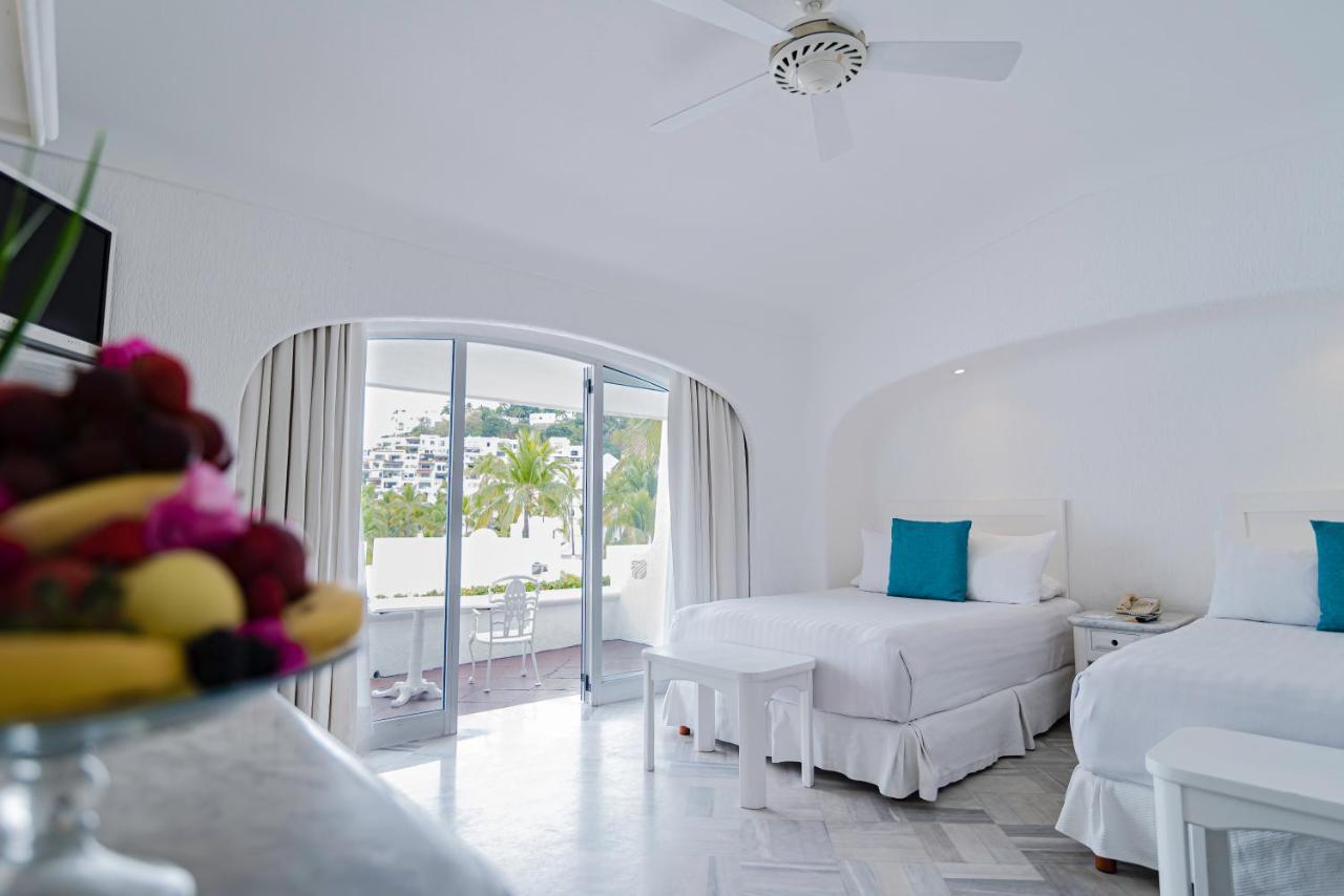 Las Hadas By Brisas Manzanillo Exteriör bild A room at the hotel