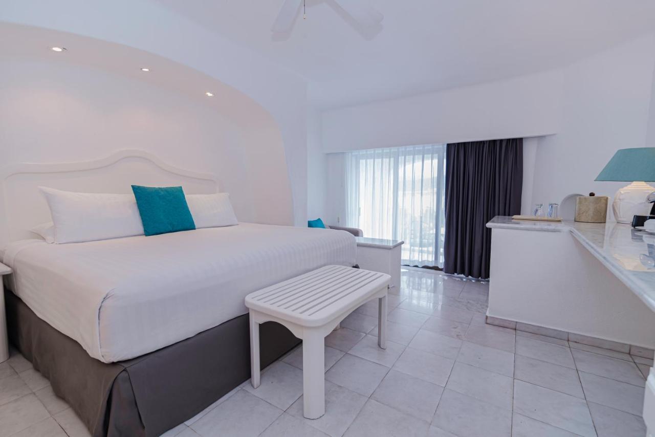 Las Hadas By Brisas Manzanillo Exteriör bild A room at the hotel